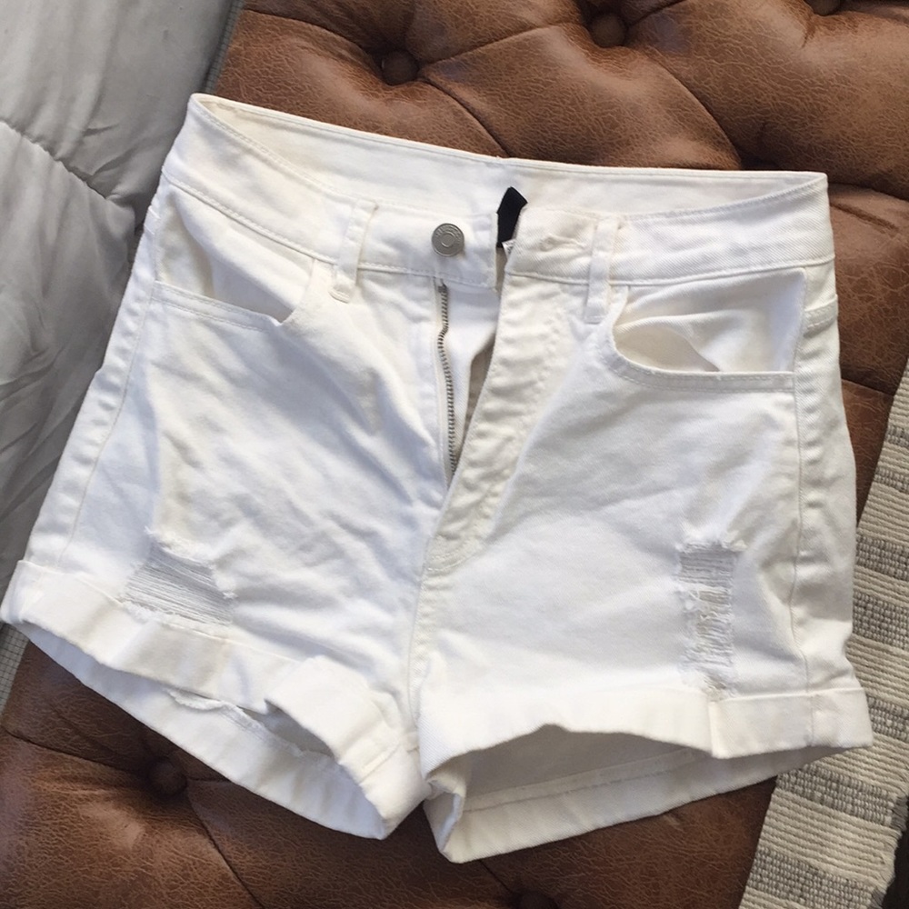 White, distressed jean shorts